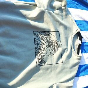 A very cute kids size 10-12 sweatshirt inspired by the wave
